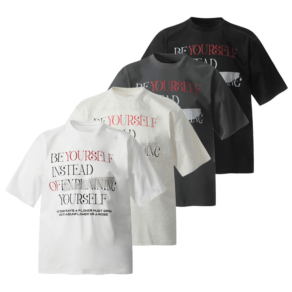 White alphabet print streetwear t-shirt worn in urban lifestyle setting, unisex INS street fashion at TeenStylo