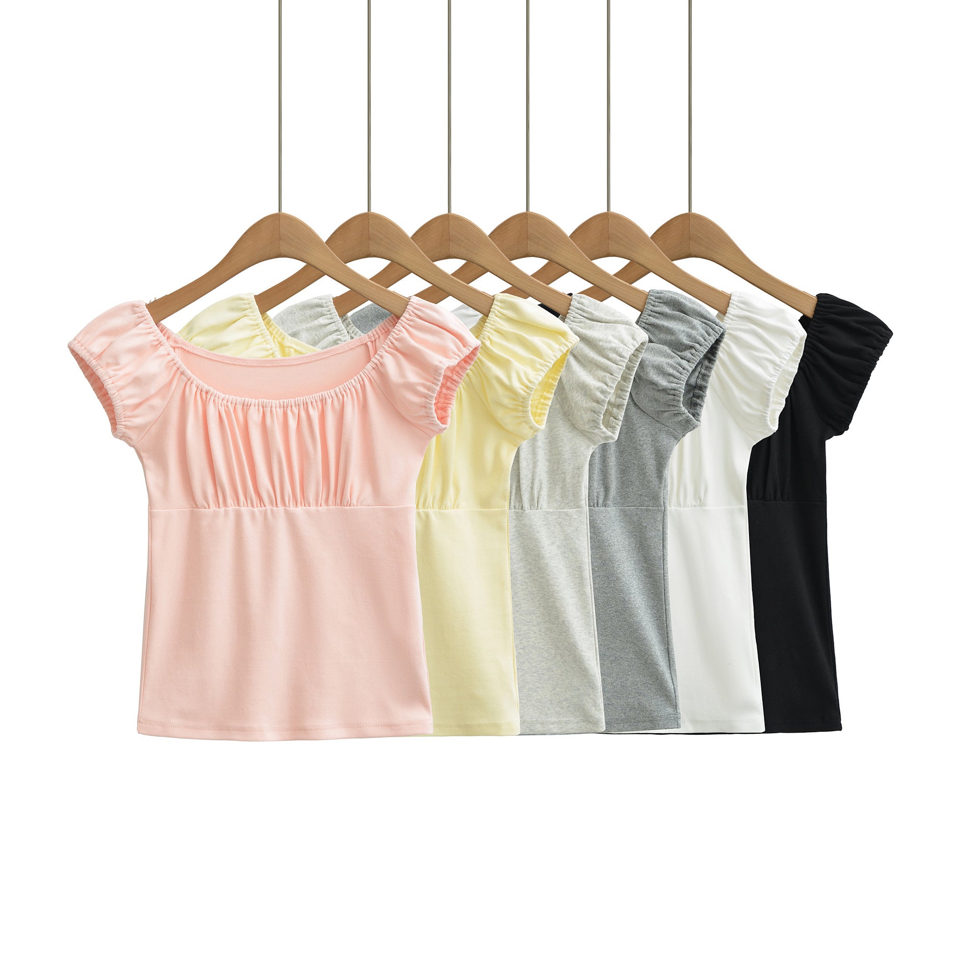 Close-up detail of black slim fit short sleeve women's T-shirt fabric and stitching | TeenStylo