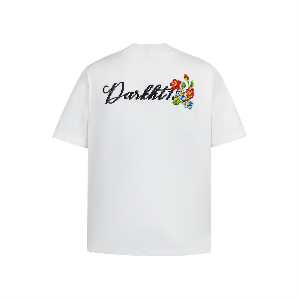 White floral embroidery letter shorts for men, Y2K streetwear style front view | TeenStylo