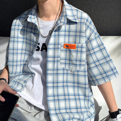 Blue checkered short sleeve shirt for men, streetwear Y2K style lifestyle look - TeenStylo