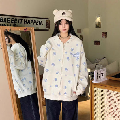 White fleece lined camo dog paw print hooded zip-up sweatshirt jacket styled as lifestyle look | TeenStylo