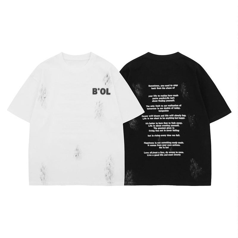 White unisex letter print loose t-shirt detail close-up showing graphic design and fabric texture | TeenStylo