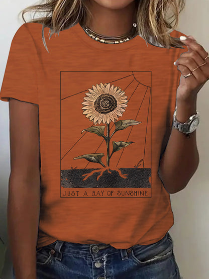 White women's short sleeve sunflower T-shirt lifestyle shot – Y2K streetwear style | TeenStylo