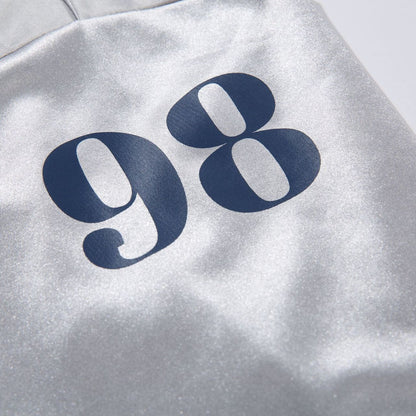White men's loose fit long sleeve graphic print tee close-up detail view – streetwear style at TeenStylo
