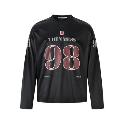 Black men's loose fit graphic print long sleeve t-shirt lifestyle shot - streetwear style | TeenStylo