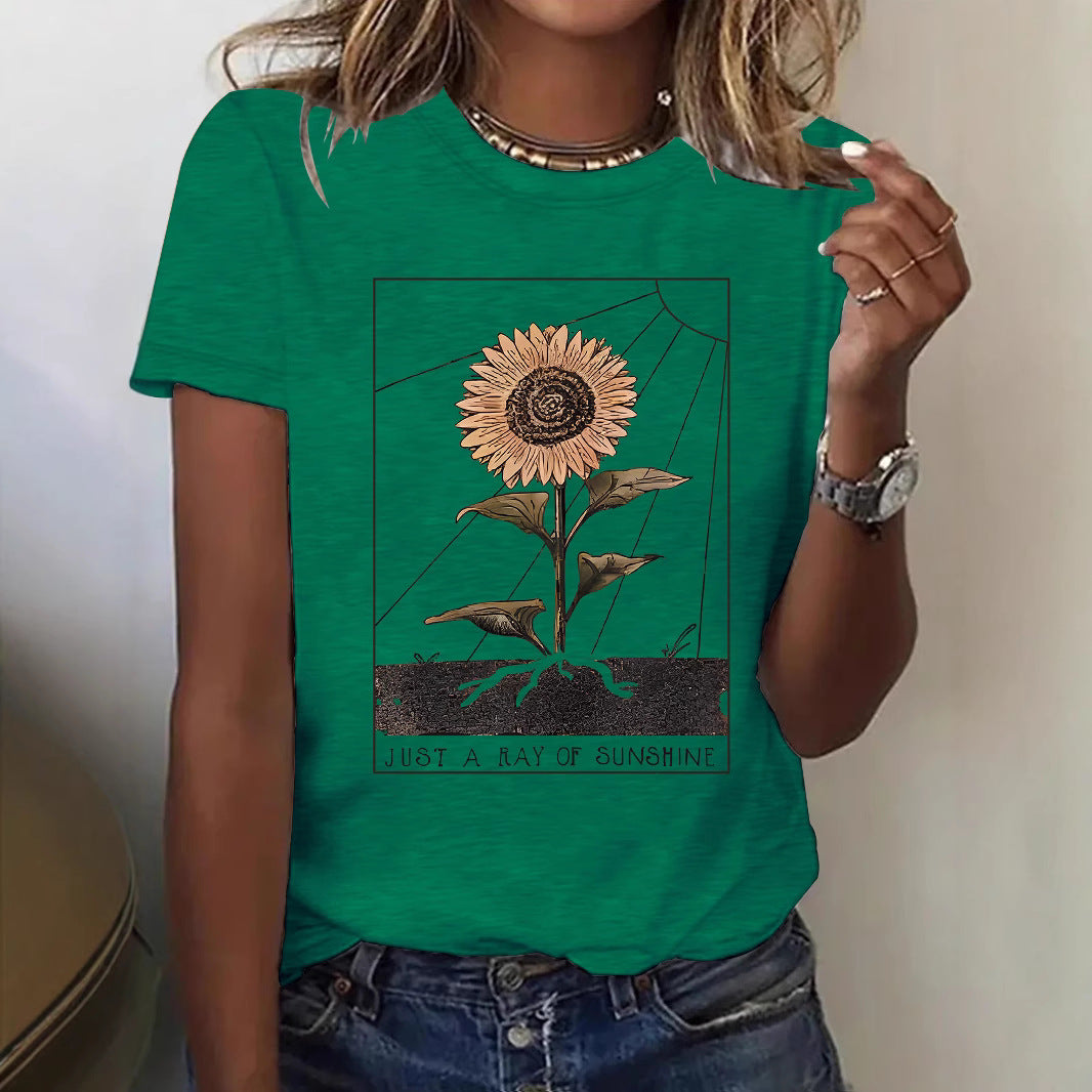 Dark red sunflower detail close-up on women's short sleeve T-shirt, Y2K streetwear style | TeenStylo
