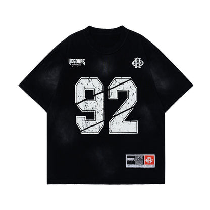 Black unisex loose half sleeve summer T-shirt lifestyle shot – Y2K streetwear style at TeenStylo