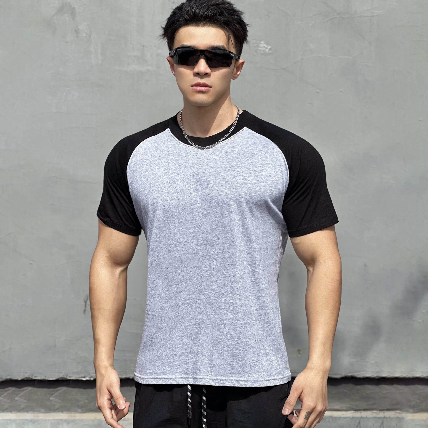 Men's light gray color-blocked raglan sleeve t-shirt lifestyle shot | TeenStylo