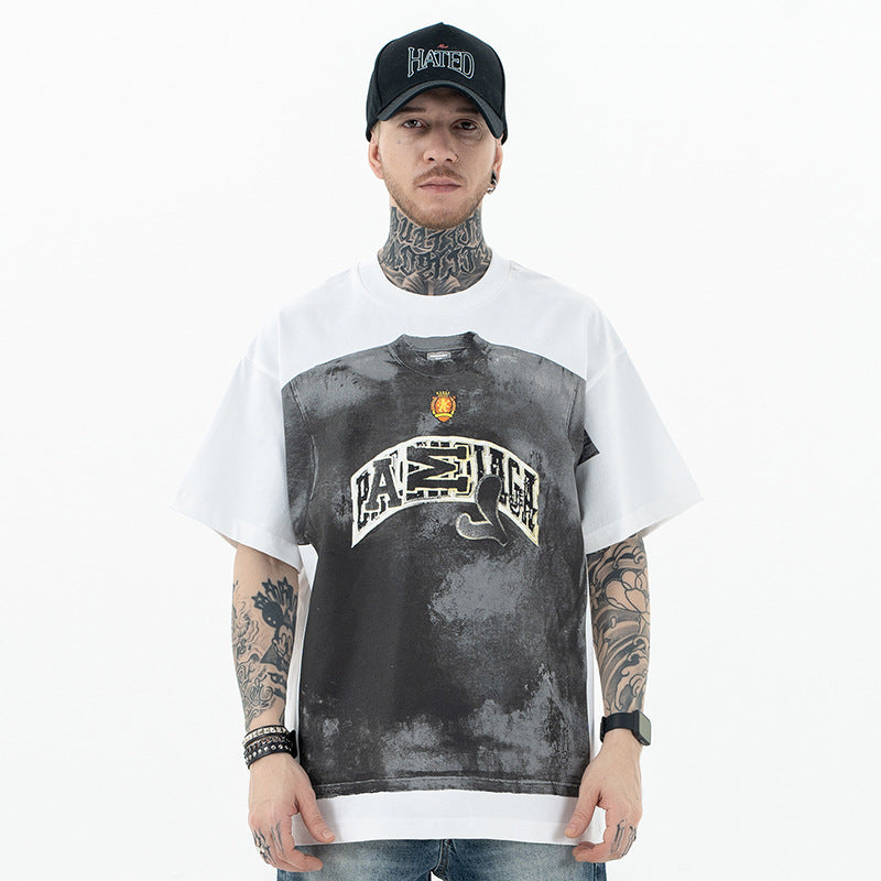 Black loose fit streetwear t-shirt styled in urban lifestyle setting for men – TeenStylo