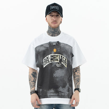 Black loose fit streetwear t-shirt styled in urban lifestyle setting for men – TeenStylo