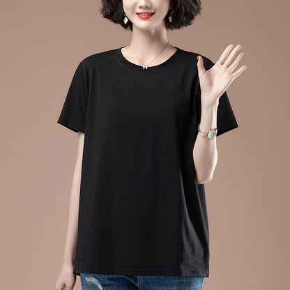 Brown women's round neck short sleeve t-shirt styled in Y2K streetwear aesthetic lifestyle shot | TeenStylo