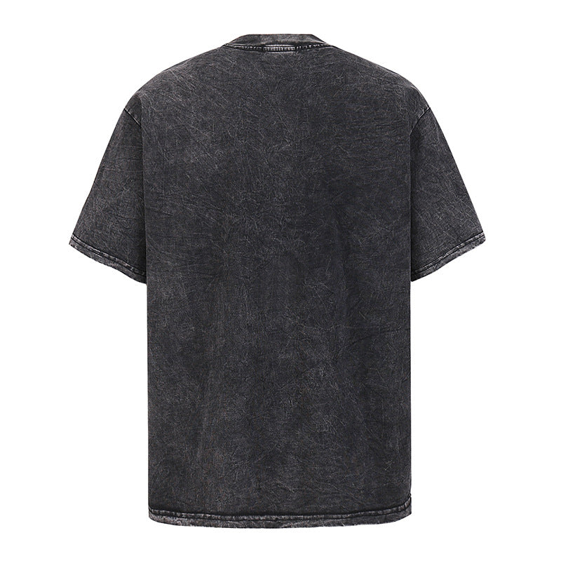 Man wearing heavyweight pure cotton skull print T-shirt in deep navy streetwear style lifestyle shot TeenStylo