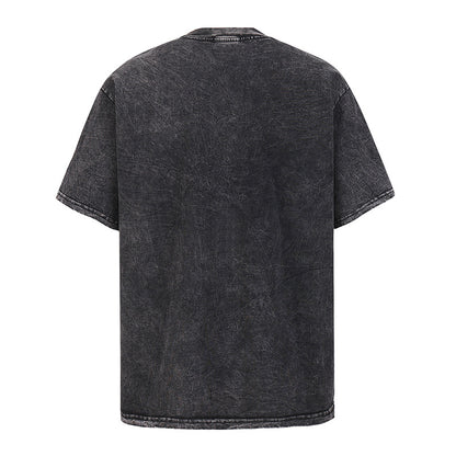 Man wearing heavyweight pure cotton skull print T-shirt in deep navy streetwear style lifestyle shot TeenStylo