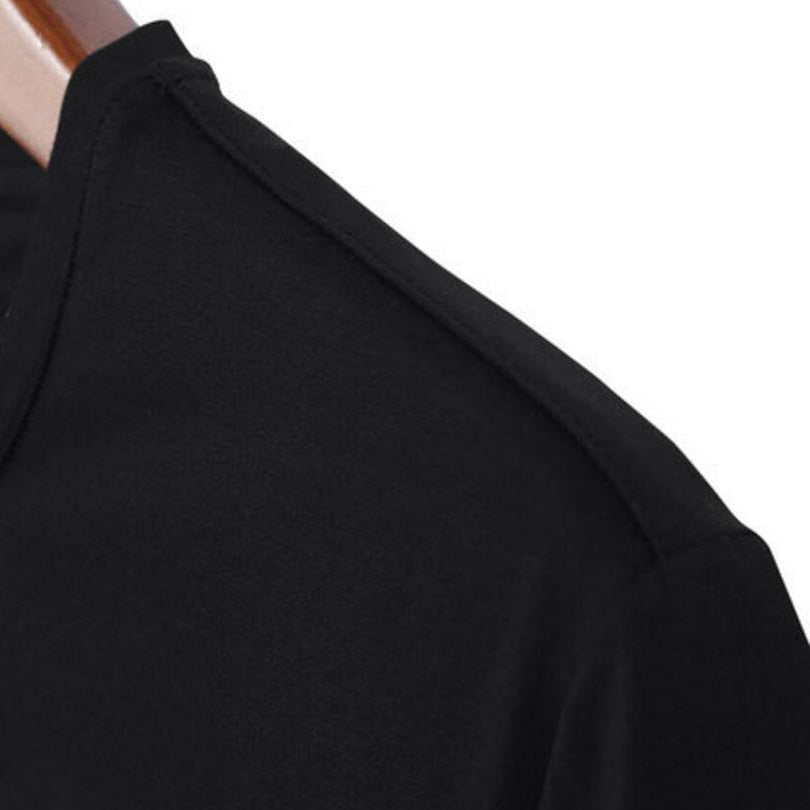 Black fashion print t-shirt close-up detail showing graphic design and fabric texture - TeenStylo