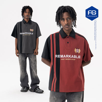 Young man wearing red streetwear polo collar loose fit short sleeve t-shirt in urban lifestyle setting | TeenStylo