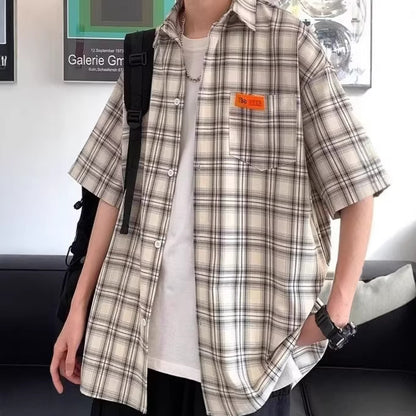 Blue checkered short sleeve shirt men close-up detail stitching fabric texture streetwear TeenStylo