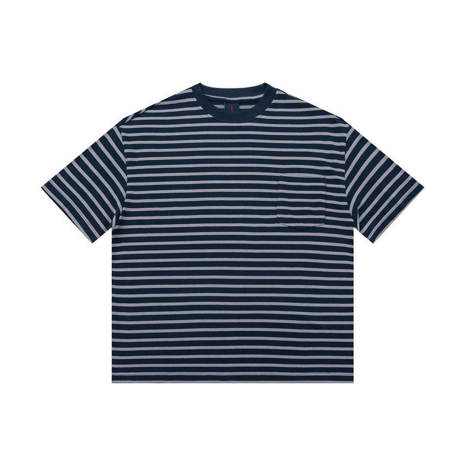 Man wearing blue striped loose fit college style short sleeve t-shirt casual lifestyle shot | TeenStylo