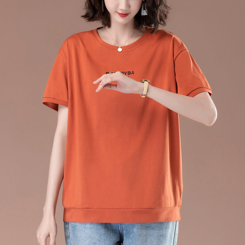 Orange red printed loose t-shirt detail view showing fabric texture and print design - TeenStylo