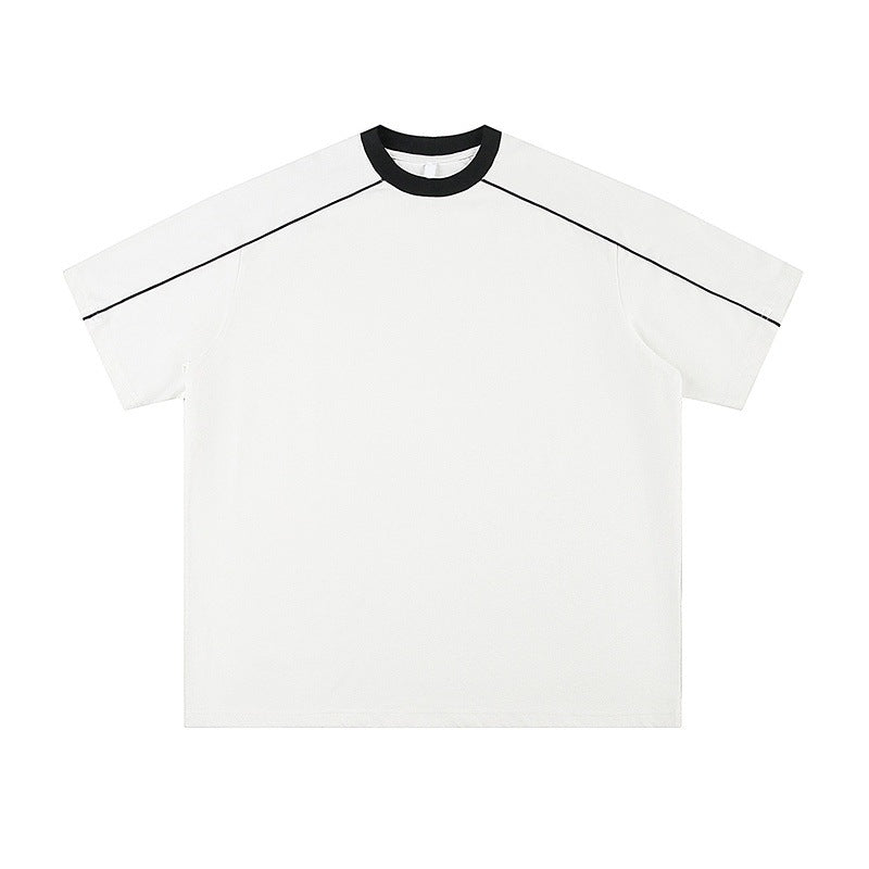 Black unisex loose summer t-shirt close-up detail, short sleeve relaxed fit streetwear style | TeenStylo