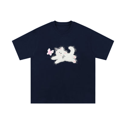 Man wearing dark blue fuzzy 3D cat graphic t-shirt in Harajuku streetwear style lifestyle shot - TeenStylo