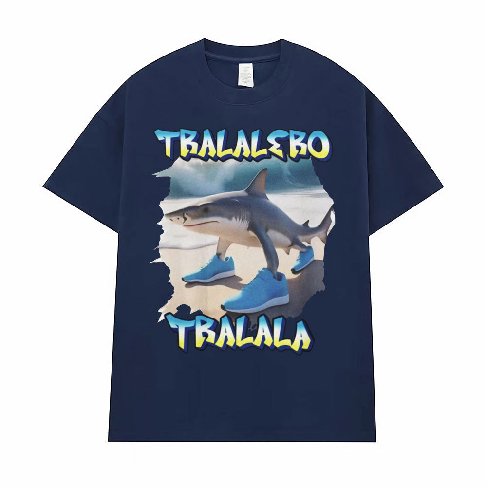 Close-up detail of black Tralalero Tralala funny running shark meme graphic on men's tee shirt | TeenStylo