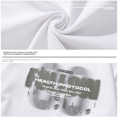 Man wearing white loose casual short sleeve t-shirt in streetwear style, relaxed lifestyle look | TeenStylo
